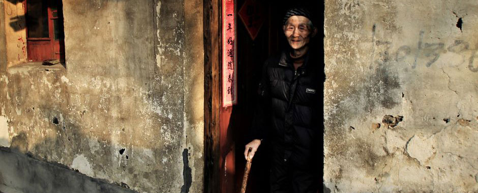 Elderly man in doorway