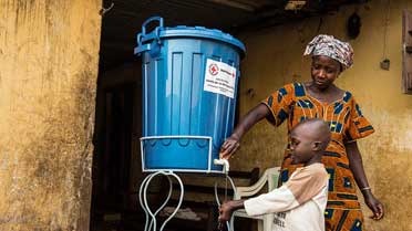 Ebola Prevention and Treatment in Conakry, Guinea. Credit: Martine Perret (CC BY-NC-ND 2.0)